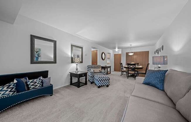 Spacious living room with natural light at Westwood Village Apartments in Westland, MI