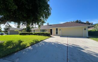 Updated 3-Bedroom Home with Spacious Yard & Community Amenities in a Prime Naples Location!