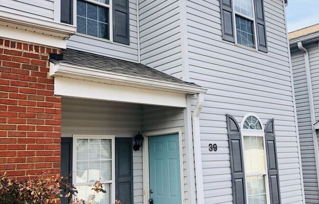 Close to Downtown Greer - this is a Fantastic 2 Bedroom, 2.5 Bathroom end unit condo that offers tons of storage and open space.