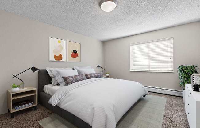 A bedroom with a large bed and a nightstand with a plant on it.