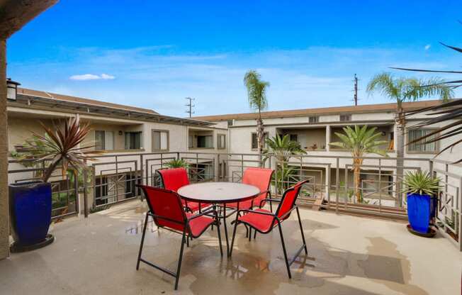 Exterior table and chair at Meridian Apartments, Los Angeles, CA, 90066