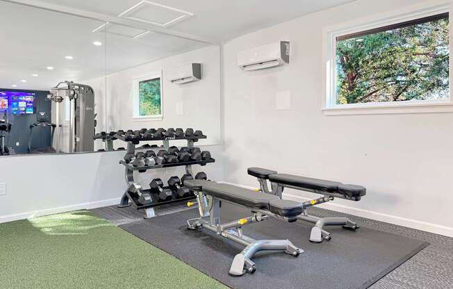 dumbells and benches at Station 121 Apartments