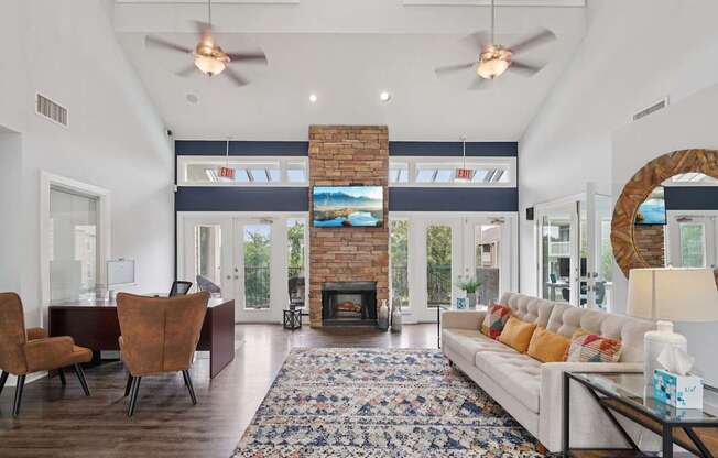 A living room with a fireplace and a couch.