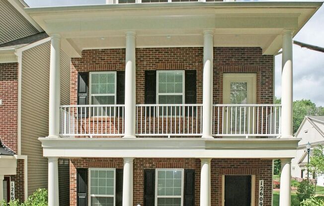 Large carriage house Semi-Detached End Unit Townhome, all 3 levels above ground.