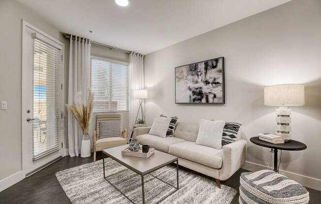 a living room with a couch and a coffee table