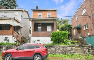 2 Bed 1 Bath House for Rent Featuring New Floors and Fixtures Conviently Close to Pittsburgh