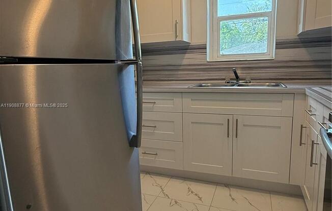 3340 NORTHWEST 13 AVE