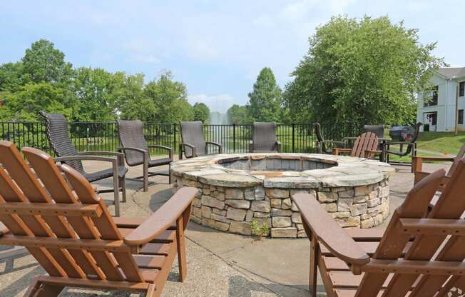 our apartments showcase an outdoor living area with a fire pit