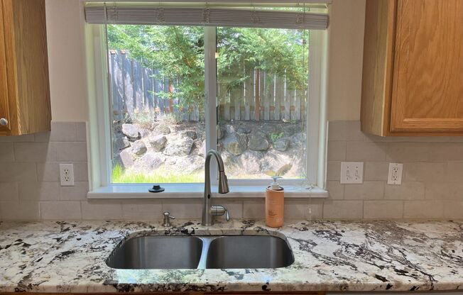 Spacious 4-Bedroom Home in Desirable Cedar Mill on Quiet Street with Fenced Yard & Attached Garage
