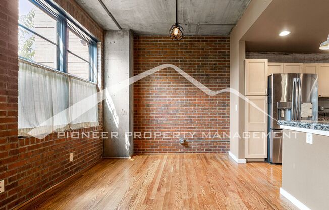 Modern Industrial Condo Downtown with Parking!