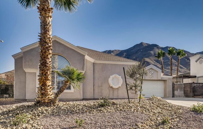 SINGLE STORY STUNNER WITH MOUNTAIN VIEWS!