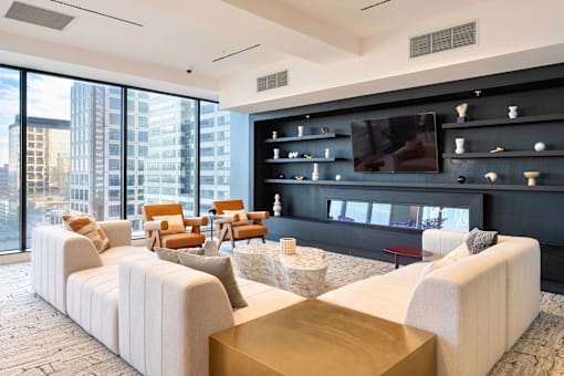 a living room filled with furniture and a large window at 220 Meridian, Indianapolis, IN 46204
