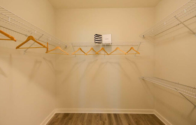 a walk in closet in a bedroom at Luxor Club, Jacksonville, FL, 32258