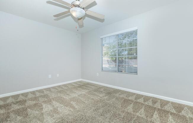 a bedroom with a large mirror