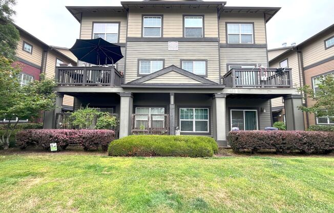 Charming 2-Bed Townhome in Sherwood with Pool Access, Garage, and Vaulted Ceilings!