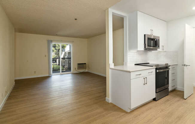 Living Room with Balcony and Hard Surface Flooring