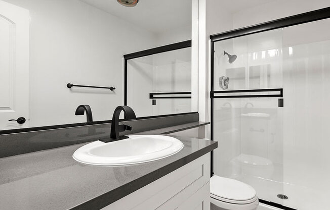 Modern styled bathroom with shower and tub.