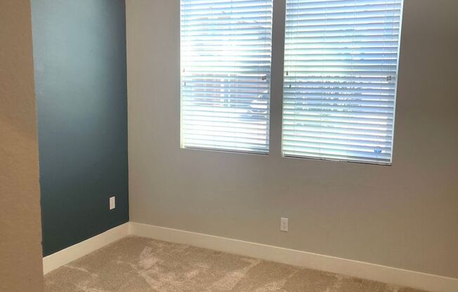 Beautiful two story home with SOLAR, NEW CARPET, PAINT, & LIGHT FIXTURES!