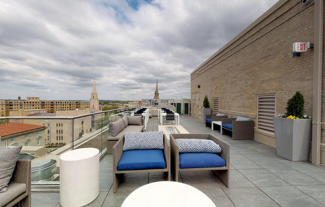 rooftop lounge and fire pit grill stations outdoor seating space