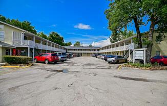 a car parked on the side of a dirt road