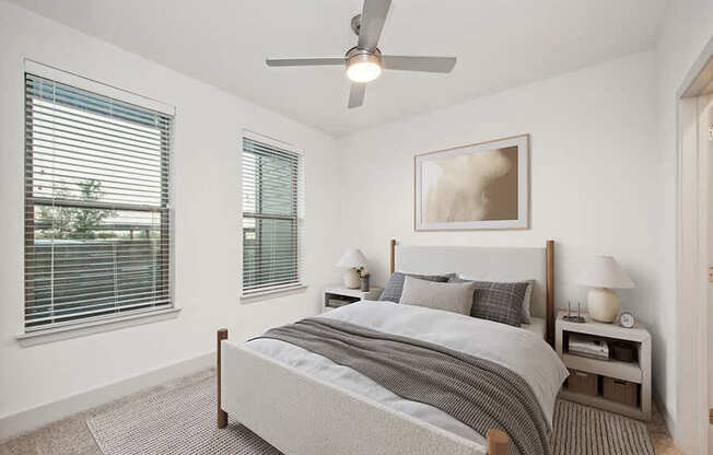 Model Bedroom with Carpet and Window View at Alta 3Eighty Apartments located in Aubrey, TX.