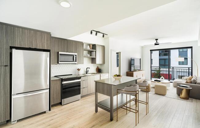 Sleek appliances, warm wood tones, and an airy layout bring everyday ease to life at your new home in Coral Springs, Florida.