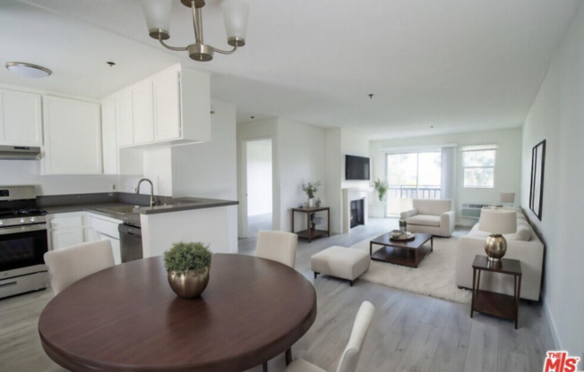 Bright hardwood floor apartments! *Fireplaces* *Gated Parking* *Stone Countertops* *Stainless Steel Appliances*