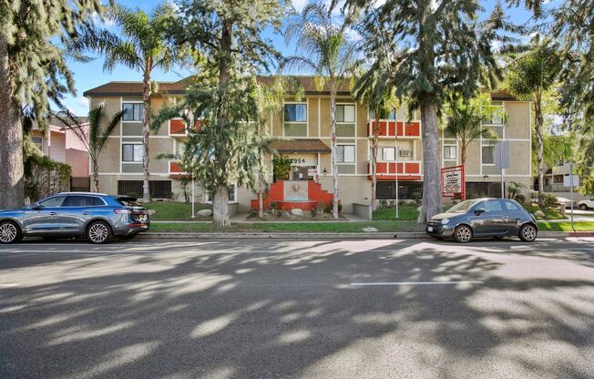 Pet-Friendly Apartments in Sherman Oaks, CA- Brody Terrace- Building Street View with Trees and Sidewalk Access