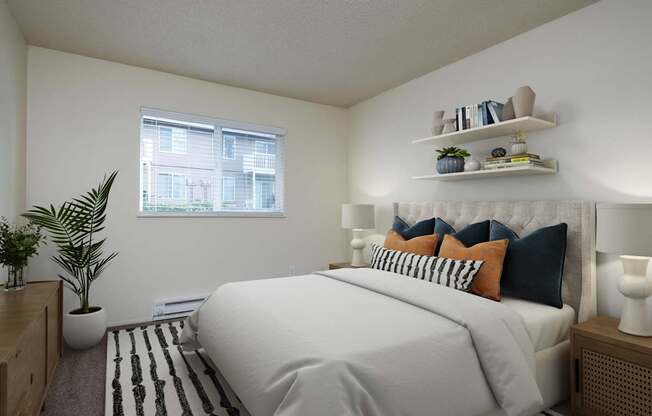 A bedroom with a large bed and a window.