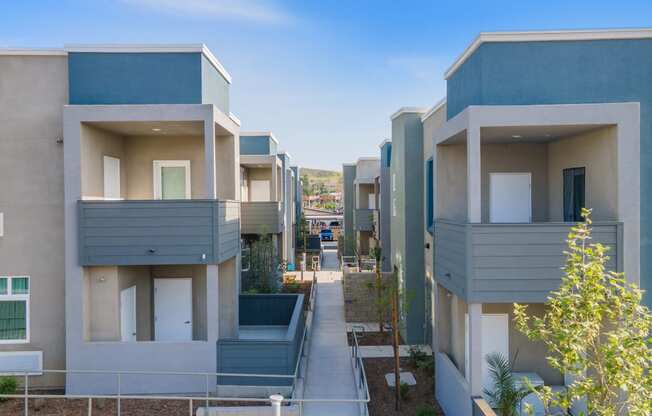 a row of apartment buildings with balconies at Loma Villas Apartments, California, 92408