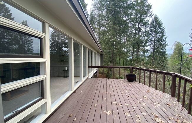 Unique View Property 3 bed, 3 bath located near the Kalispel Golf & Country Club & Whitworth. You must see this one!
