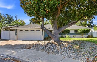 Available Now! Charming Ranch with Versatile Bonus Rooms and Garden Retreat