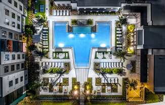 a birds eye view of a hotel with a pool in the middle of a building at The Alibi at Lake Lilly, Ocoee, FL