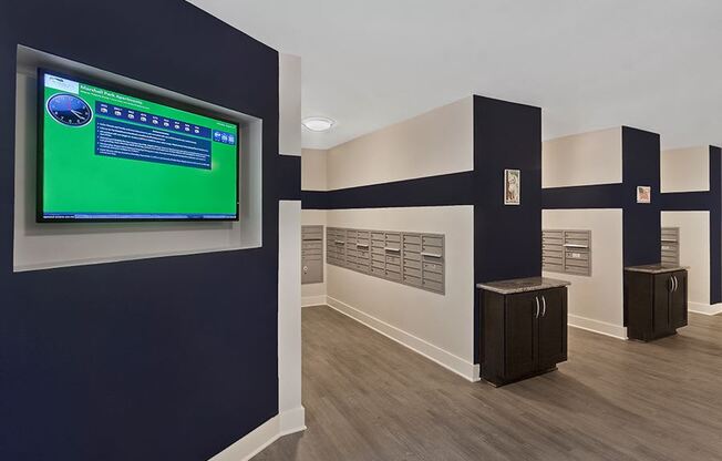 Crabtree Apartments in Raleigh near Red Hat - Marshall Park mail room with package notification