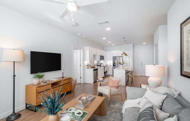 a living room and kitchen in a 555 waverly unit