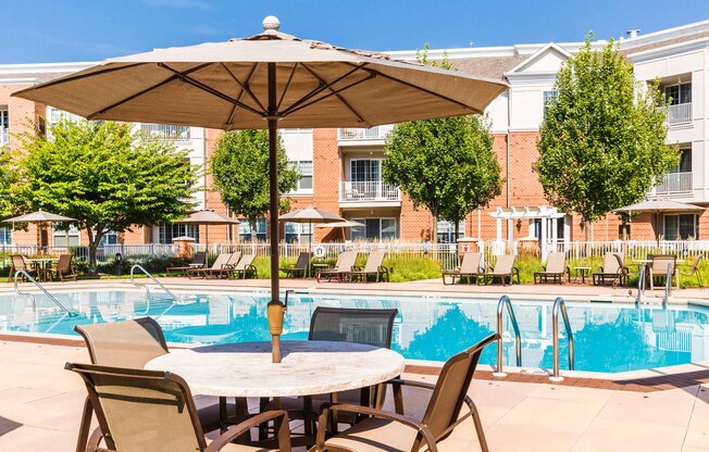 our apartments offer a swimming pool with patio furniture