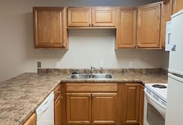 Bright, roomy unit available August 01st!  Convenient location at a great price - $3150/month includes 2 assigned Parking Spaces!