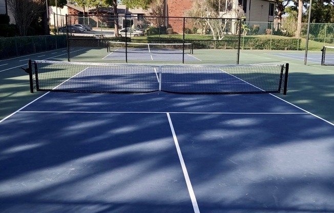 Full size tennis court and two pickle ball courts