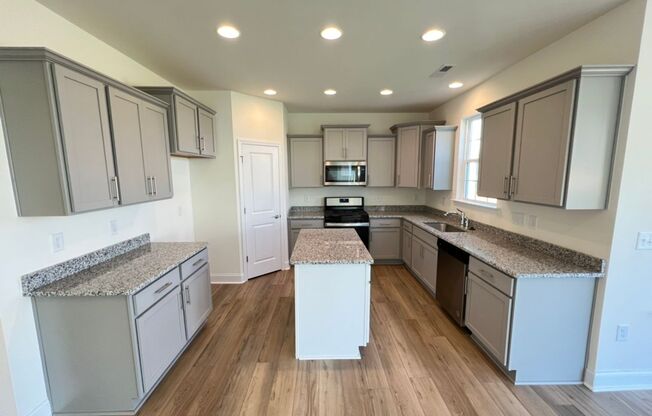 LIKE NEW 4 Bedroom Home w/ Ground Floor Bedroom