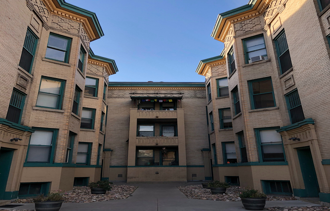 Explore the charm of this historic apartment, featuring timeless architecture and inviting outdoor space.