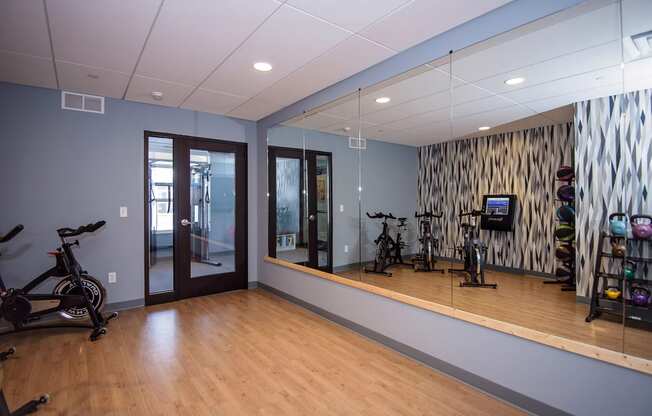 Fitness Studio with Large Wall Mirrors