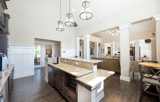 a large kitchen with a large island in the middle