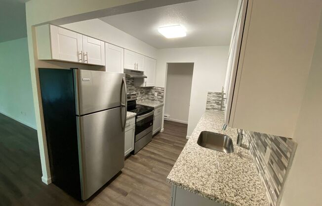 2 beds, 1 bath, 1,014 sqft, $2,135, Unit 102