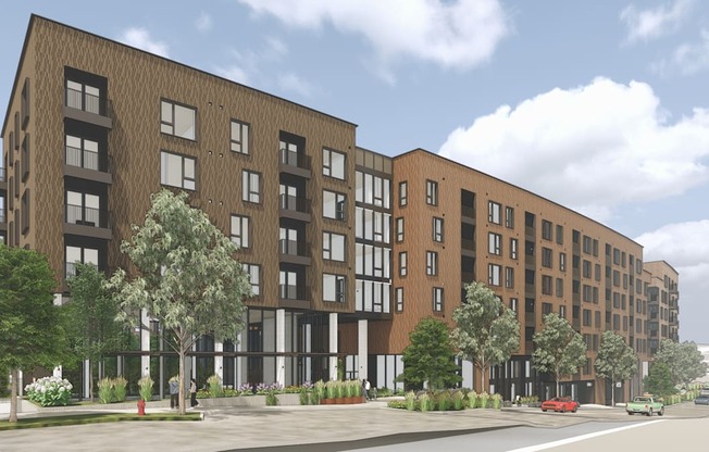 a rendering of a new apartment building on a city street