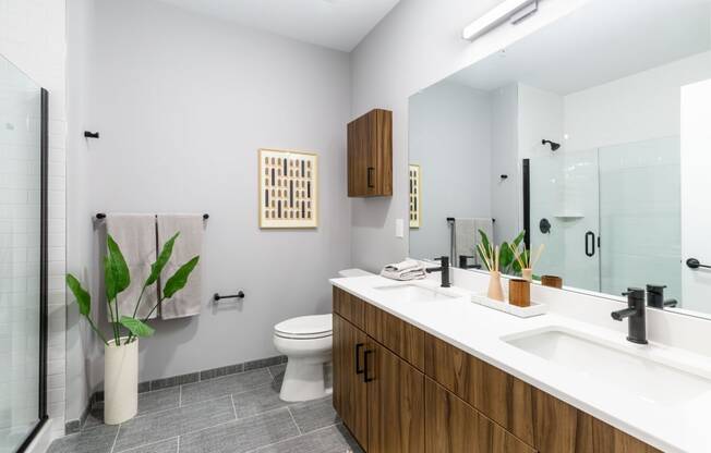 a bathroom with a sink and a toilet and a shower at Dey & Bergen, New Jersey, 07029