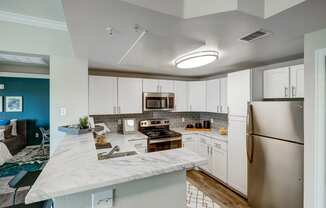 The Fletcher Model Apartment Kitchen at The Fletcher Southlands, Colorado, 80015