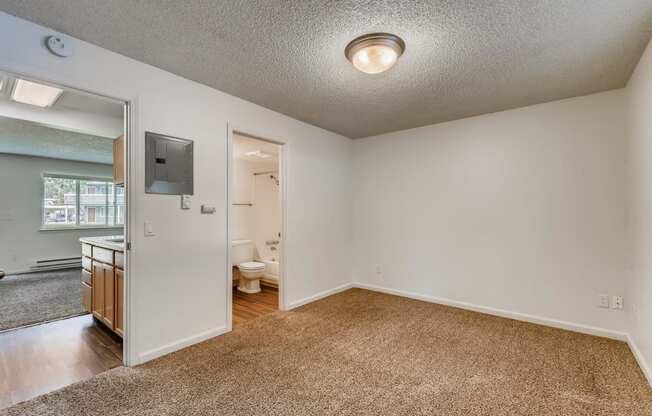 The Bedroom and Bathroom in a One Bedroom Apartment at Morningtree Park Apartments