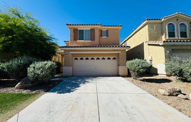 4 bedroom 3 bath home with separate family and living rooms! Tile and vinyl planks throughout as well as a large covered patio!