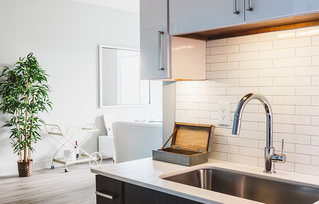 Subway tile backsplashes and upgraded finishes in our modern kitchens