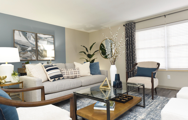 Experience tranquility in this elegantly designed living room, perfect for relaxation and entertaining.